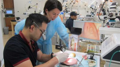Group of dental professionals attending an ongoing training session